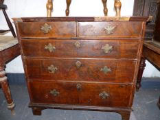 AN 18th.C.WALNUT CHEST OF TWO SHORT AND THREE LONG GRADUATED DRAWERS RAISED ON LATER BRACKET FEET.