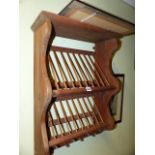 AN ANTIQUE STYLE PINE PLATE DRYING RACK.