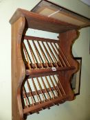 AN ANTIQUE STYLE PINE PLATE DRYING RACK.