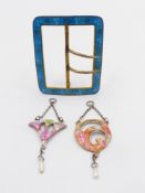 TWO PRECIOUS WHITE METAL,TESTED AS SILVER, ART NOUVEAU ENAMELLED PENDANTS TOGETHER WITH AN ENAMELLED