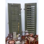 A PAIR OF VINTAGE SHUTTER DOORS.