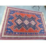 A PERSIAN AFSHAR RUG. 208x156cms TOGETHER WITH A CAUCASIAN DESIGN SMALL RUG.