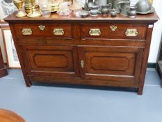 AN 18th.C.OAK AND INLAID SMALL DRESSER WITH TWO DRAWERS OVER TWIN PANEL DOORS. W.137 x H.83cms.