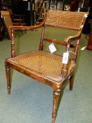 A PAIR OF 19th.C.CANE SEAT AND BACK REGENCY STYLE PAINTED ARMCHAIRS.