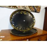 TWO VICTORIAN PAPIER MACHE LARGE OVAL TRAYS WITH GILT AND PAINTED DECORATION.