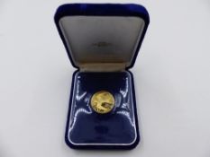 A BRITISH VIRGIN ISLANDS 1975 100 DOLLAR FINE GOLD COIN, UNCIRCULATED.