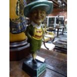 A VINTAGE STYLE PENFOLD GOLF BALL ADVERTISING FIGURE " HE PLAYED A PENFOLD"