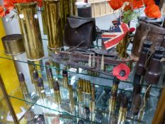 A GROUP OF WWI MILITARY SMALL ARTILLERY SHELLS, TRENCH ART ITEMS TOGETHER WITH TWO WIRE CUTTERS,