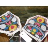 A NER PAIR OF NORTH AMERICAN WOODLAND INDIAN BEADWORK PURSES EACH WITH FLORAL DESIGNS ON BLACK