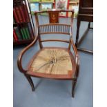 AN EDWARDIAN MAHOGANY AND INLAID SALON ARMCHAIR.