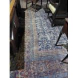 AN ANTIQUE PERSIAN FEREGHAN CARPET. 443 x 415cms.