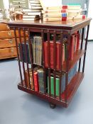 AN EDWARDIAN MAHOGANY LARGE REVOLVING BOOKCASE. W.66 x L.66 x H.94cms.