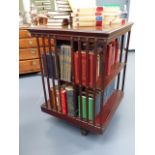 AN EDWARDIAN MAHOGANY LARGE REVOLVING BOOKCASE. W.66 x L.66 x H.94cms.