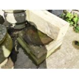 A CARVED STONE PEDESTAL BIRD BATH.