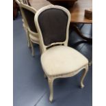 A SET OF EIGHT FRENCH PAINTED SHOW FRAME SALON OR DINING CHAIRS.