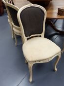 A SET OF EIGHT FRENCH PAINTED SHOW FRAME SALON OR DINING CHAIRS.