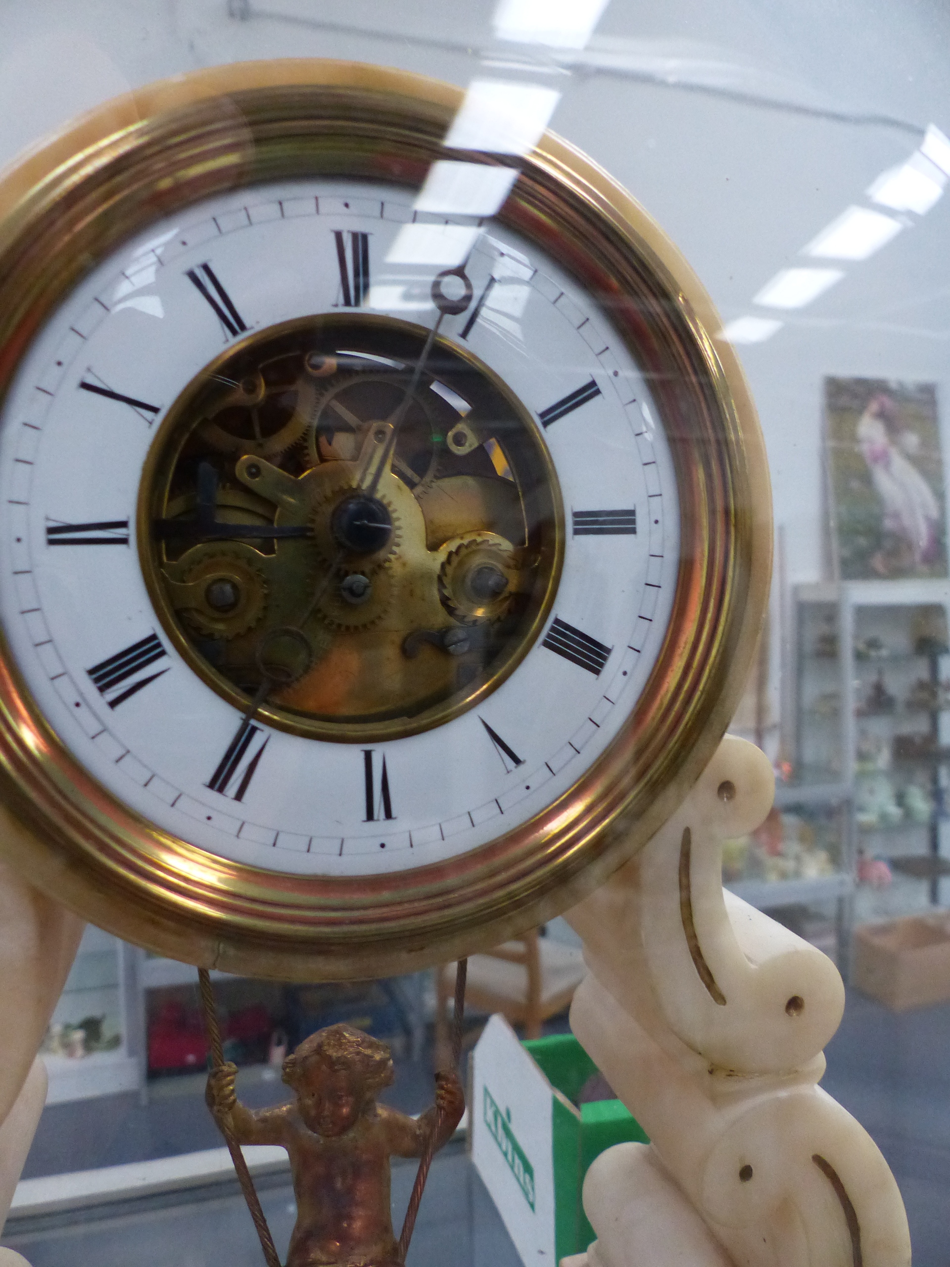 A VICTORIAN WHITE METAL MANTLE CLOCK WITH CHERUB SWING PENDULUM, WHITE ENAMEL CHAPTER RING WITH - Image 2 of 11