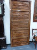 A 16th/17th.C.CARVED PINE PANEL SECTION WITH FIVE INSET LINENFOLD PANELS. W.105 x H.232cms. APPROX.