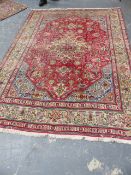 A PERSIAN HERIZ CARPET. 287x209cms.