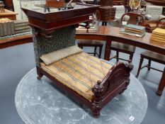 A VICTORIAN MAHOGANY DOLL'S HALF TESTER BED WITH HAND SEWN MATTRESS AND BOLSTER.