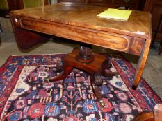 AN EARLY 19th.C.MAHOGANY SOFA TABLE ON CARVED COLUMN AND SCROLL QUADROPED LEGS.