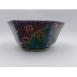 AN UNUSUAL ORIENTAL DEEP PANELLED FORM BOWL WITH CENTRAL LANDSCAPE SURROUNDED BY FIGURAL AND