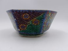 AN UNUSUAL ORIENTAL DEEP PANELLED FORM BOWL WITH CENTRAL LANDSCAPE SURROUNDED BY FIGURAL AND