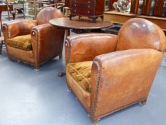 A PAIR OF FRENCH ART DECO BROWN LEATHER CLUB ARMCHAIRS WITH VELVET SEAT CUSHIONS.