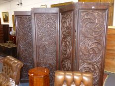 A LARGE AND IMPRESSIVE 19th.C.CARVED OAK FIVE PANEL ROOM DIVIDER SCREEN DECORATED WITH GOTHIC FORM