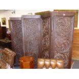 A LARGE AND IMPRESSIVE 19th.C.CARVED OAK FIVE PANEL ROOM DIVIDER SCREEN DECORATED WITH GOTHIC FORM