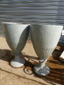 A PAIR OF VICTORIAN CAST IRON GARDEN URNS.