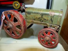 AN EARLY BING TINPLATE CLOCKWORK TOY TRACTOR MARKED BINGWERK, GERMANY.