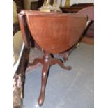 AN UNUSUAL INLAID MAHOGANY GEORGIAN AND LATER DROP LEAF REVOLVING TOP LAMP TABLE WITH SHAPED TOP AND