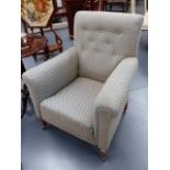 TWO LATE VICTORIAN/EDWARDIAN ARMCHAIRS EACH UNIFORMLY UPHOLSTERED.