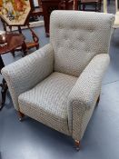 TWO LATE VICTORIAN/EDWARDIAN ARMCHAIRS EACH UNIFORMLY UPHOLSTERED.