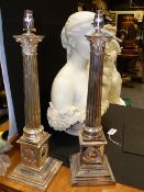 A PAIR OF ANTIQUE SILVER PLATE CORINTHIAN COLUMN FORM TABLE LAMP BASES WITH STEPPED PLINTHS