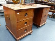 AN ANTIQUE PADOUK WOOD EXPORT TWIN PEDESTAL DESK WITH MOULDED EDGE RECTANGULAR TOP ABOVE TWO BANKS