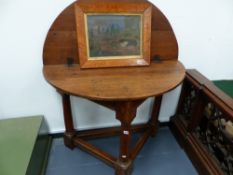 AN 18th.C.AND LATER OAK FOLD OVER CREDENCE TABLE ON GUN BARREL TURNED SUPPORTS. D.112cms.