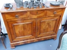 A 19th.C.FRENCH WALNUT SIDE CABINET WITH THREE DRAWERS OVER PANELLED DOORS. W.137 x H.104cms.