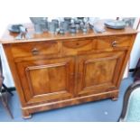 A 19th.C.FRENCH WALNUT SIDE CABINET WITH THREE DRAWERS OVER PANELLED DOORS. W.137 x H.104cms.