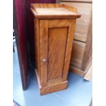 A VICTORIAN SATINBIRCH BEDSIDE CABINET. W.36 x H.92cms.