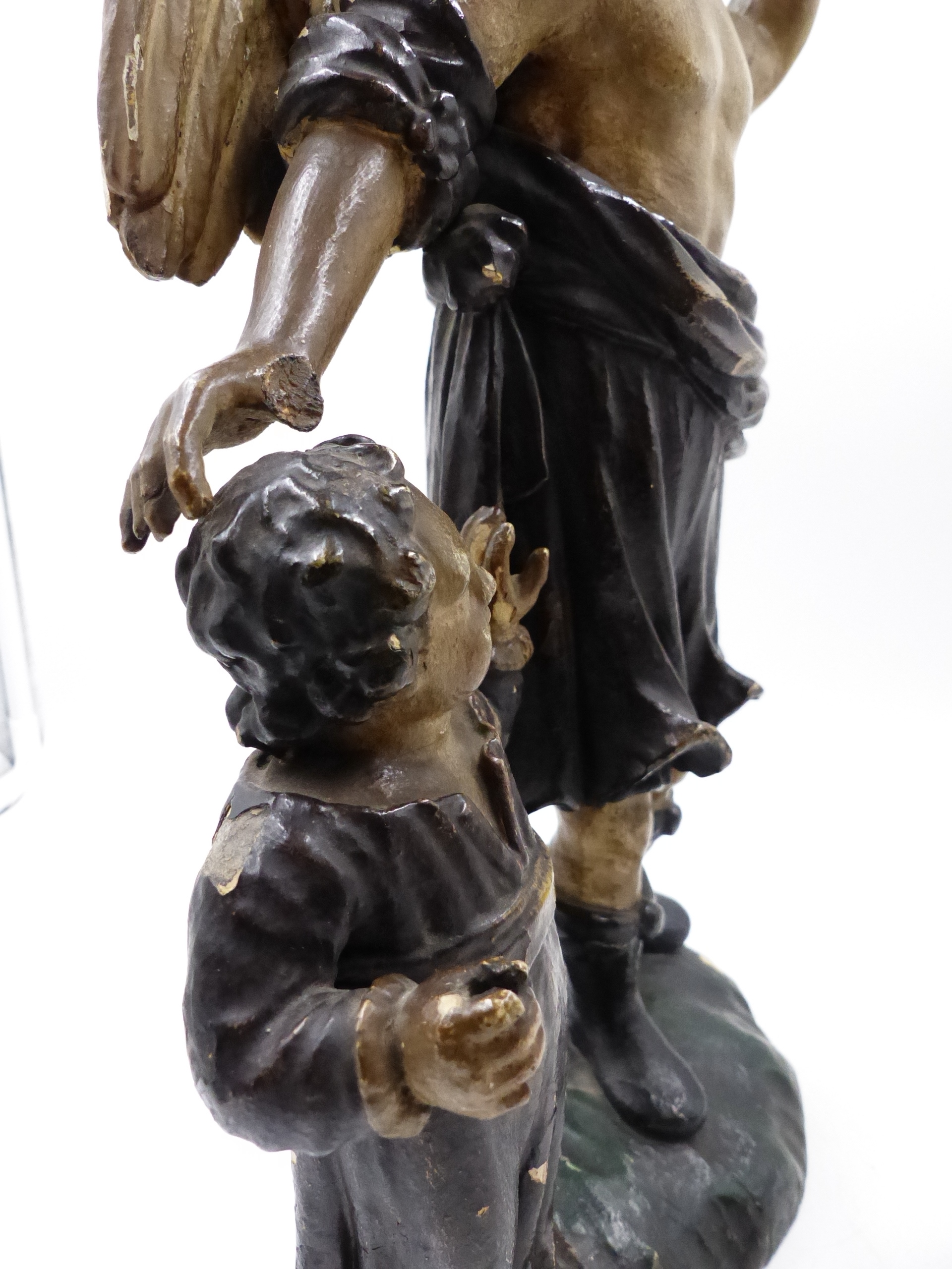 AN EARLY CARVED POLYCHROMED CONTINENTAL STANDING FIGURE OF AN ANGEL WITH A CHILD. H.38.5cms. - Bild 22 aus 25