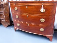 A GOOD LATE GEORGIAN MAHOGANY BOW FRONT CHEST OF THREE LONG GRADUATED DRAWERS WITH FELT LINED