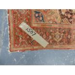 AN ANTIQUE PERSIAN MAYLAYER RUG. 202x139cms.