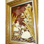 AN UNUSUAL LARGE VINTAGE PILED WOOLWORK PICTURE OF SWANS IN MOULDED GILT FRAME. 66 x 43cms.