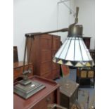 A PAIR OF ART DECO STYLE DESK LAMPS WITH LEADED GLASS SHADES.