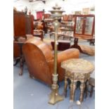 A HEAVY BRONZE VINTAGE COLUMN FORM TORCHERE/FLOOR LAMP. H.132cms.