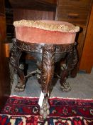 A 19th.C.CARVED HARDWOOD PIANO STOOL WITH RISING TOP.