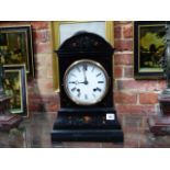 A VICTORIAN EBONISED MANTLE CUCKOO CLOCK WITH TWIN FUSEE MOVEMENT AND WHITE ENAMEL DIAL. H.45cms.
