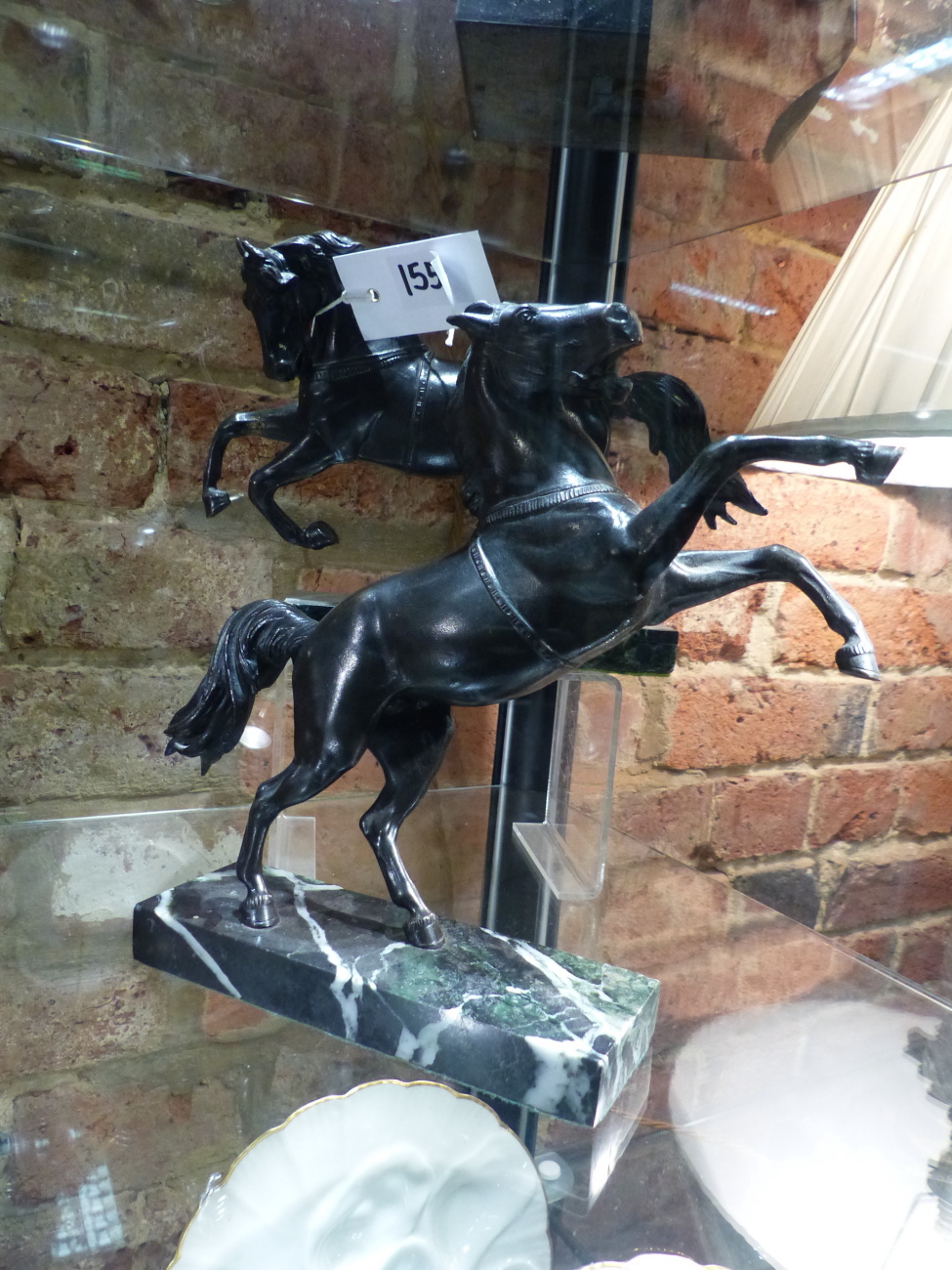 TWO ITALIAN GRAND TOUR BRONZE FIGURES OF PRANCING HORSES ON LATER MARBLE BASES. OVERALL H.24cms